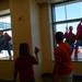 Children watch as superheroes hang from a rope outside of an eighth-floor window at C.S. Mott Children's Hospital on Monday, June, 3, 2013. Melanie Maxwell I AnnArbor.com